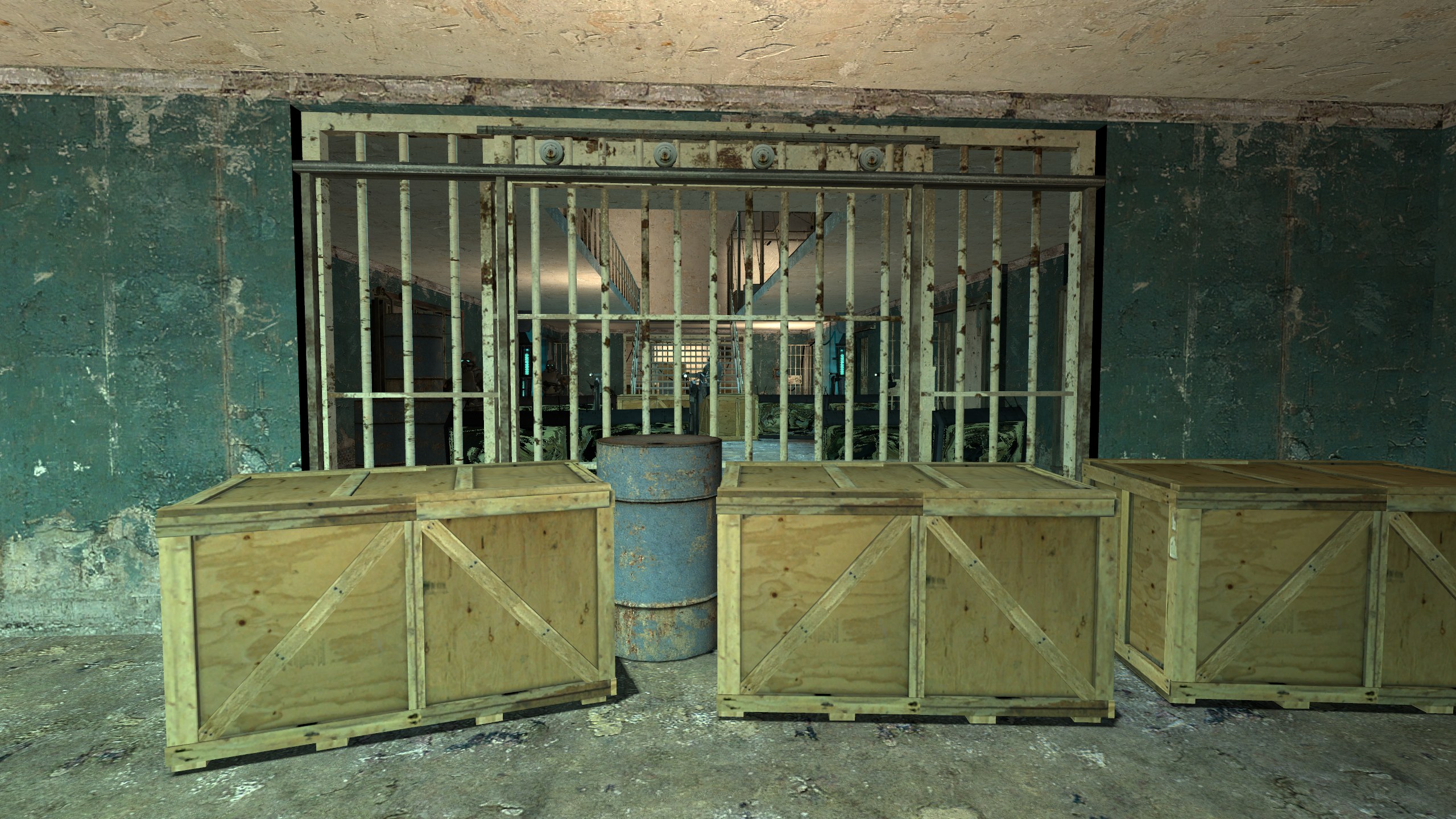 Crate barricade framing the cell block entrance